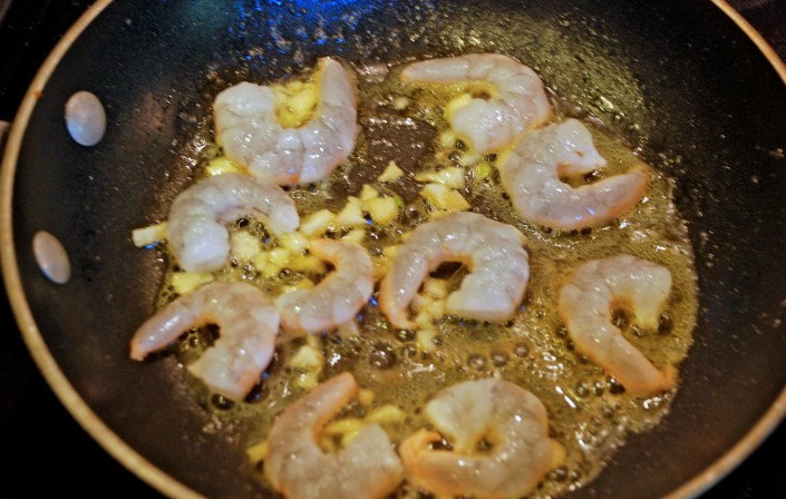 shrimp-starts-to-turn-pink-in-skillet-with-butter-and-garlic